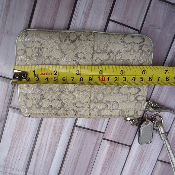 Coach wristlet with classic signature print canvas. - Picture 12 of 16